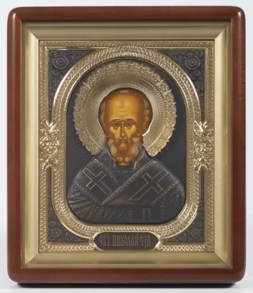 Icon in icon case 18×24 shaped, tempera, combined riza (gilt patina) Nicholas the Wonderworker
