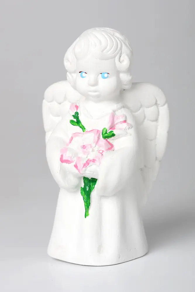 Guardian Angel plaster sculpture with lily
