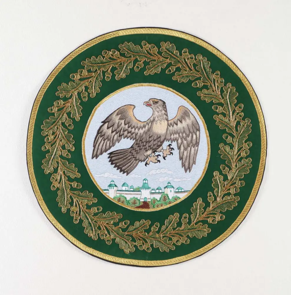 Eagle rug embroidered small (d 66 cm) machine embroidery green