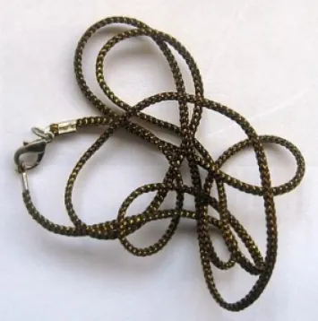 Cross cord lurex with snap hook